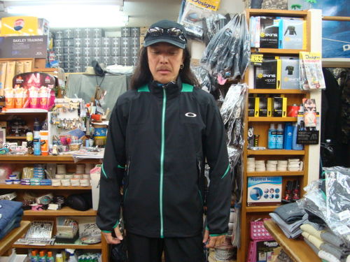ACCELERATOR WIND JACKET 2.0 419236JP（カラー：BLACK/GREEN 063）サイズ：XL（日本サイズ）